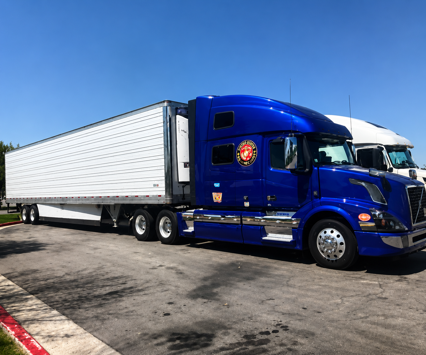 Fox Trucking blue Volvo with reefer trailer